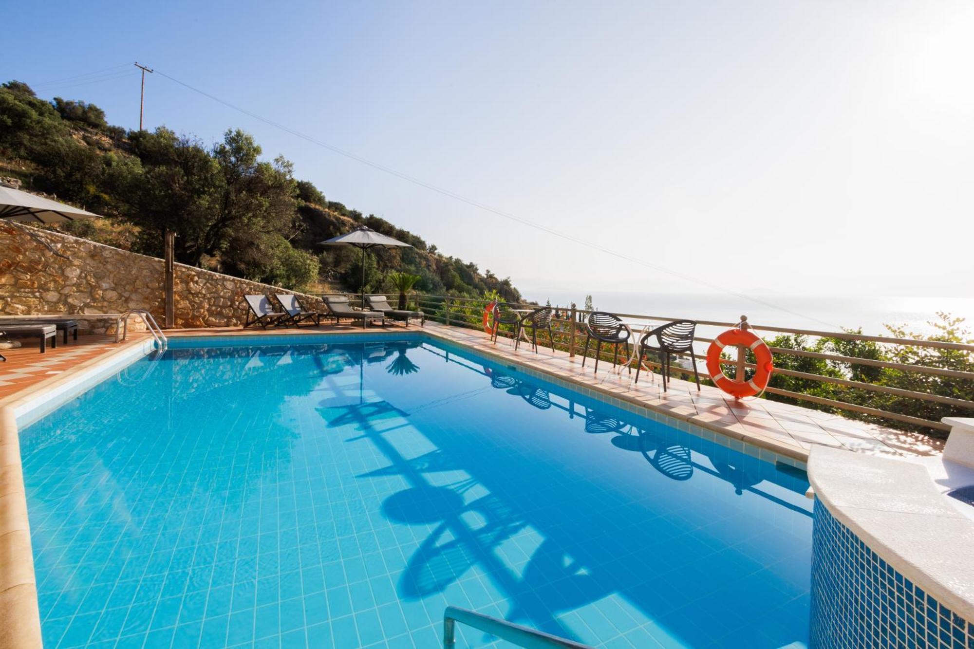 Blue Horizon Suites Parálion Ástros 外观 照片