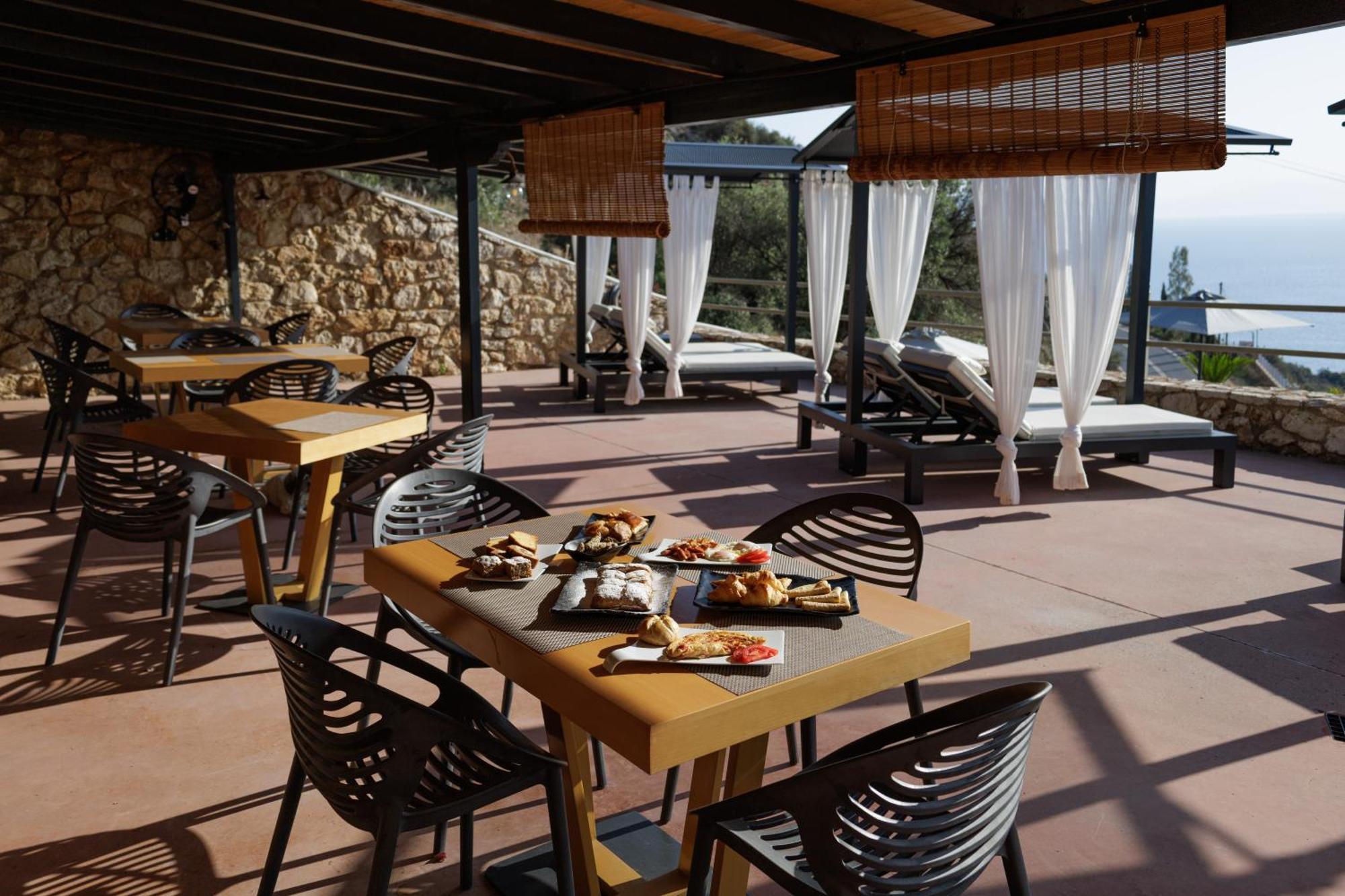 Blue Horizon Suites Parálion Ástros 外观 照片